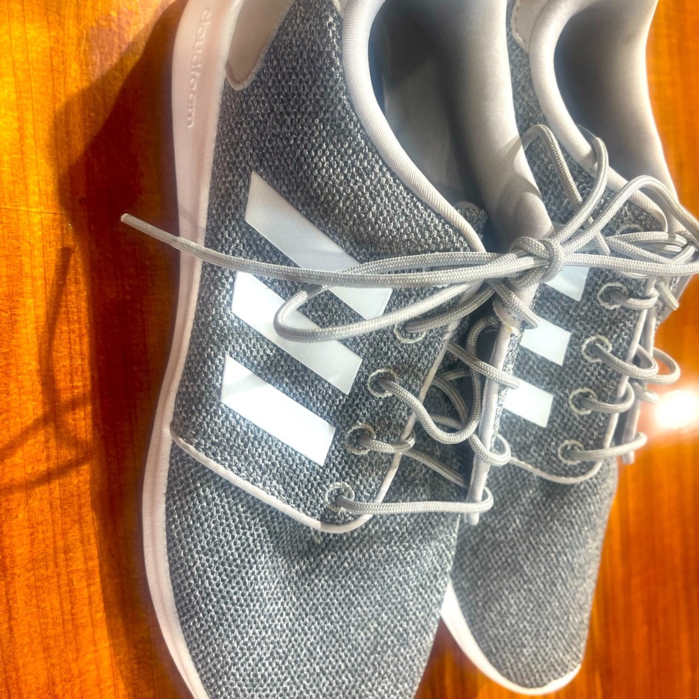 Adidas running shoes never worn outside
